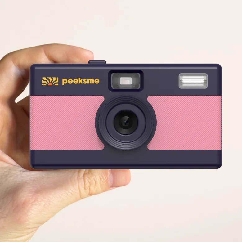 Appareil photo peeksme rose + 1 paire de clips jaune + 1 lanière bleue