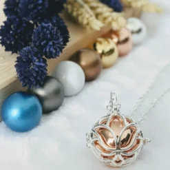 Bola cage - bille rose - lotus
