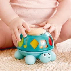 Boîte à musique tortue d'éveil rotative Hape