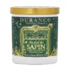 Bougie parfumée au pied du sapin
