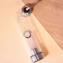 Bouteille en verre pointe quartz rose