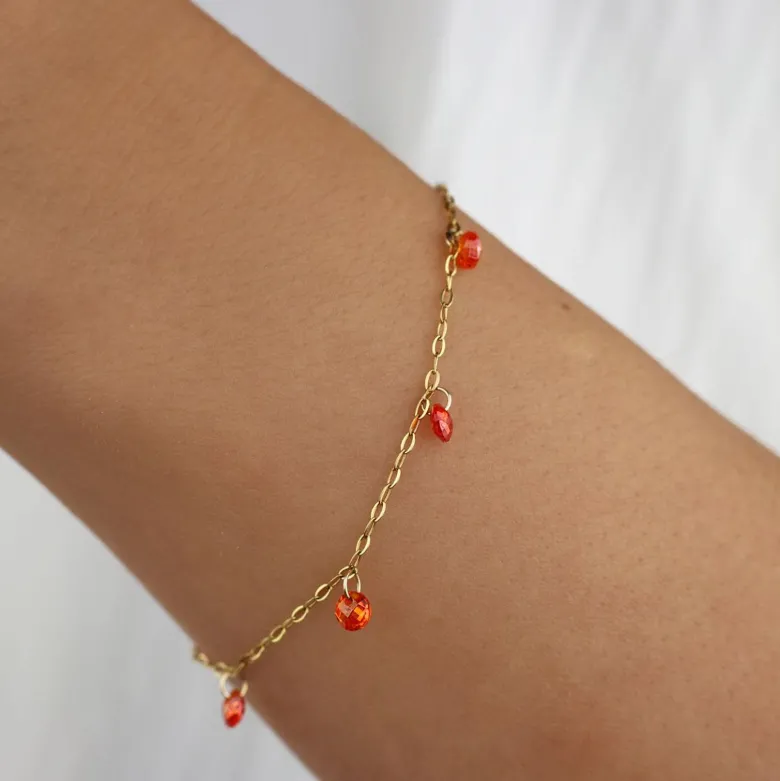 Bracelet femme fin avec breloques strass oranges