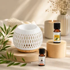Brûle-parfum treillis + he arbre à thé + synergie méditation