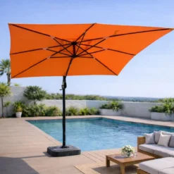 Cesare parasol rectangulaire 3x4m déporté rotatif orange en aluminium