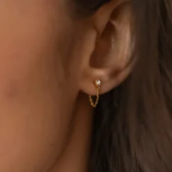 Clou doré strass blanc et chaine