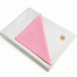 Couverture en coton bio blanc et rose