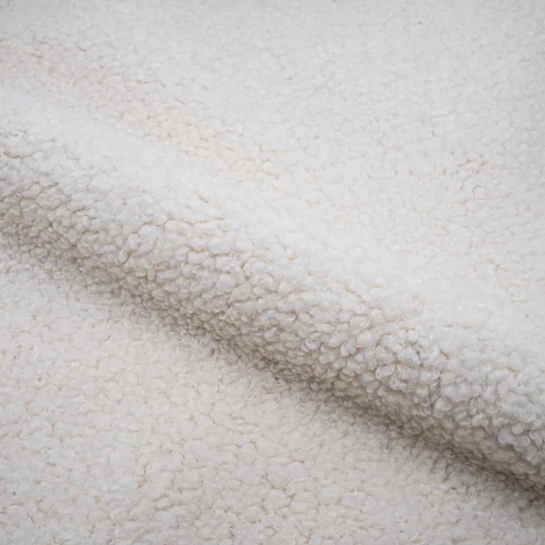 Fauteuil blanc en tissu effet laine bouclette - glam