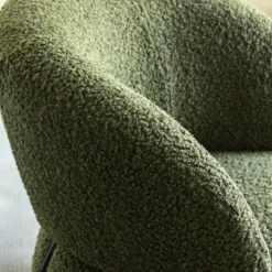 Fauteuil en tissu vert