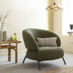 Fauteuil en tissu vert