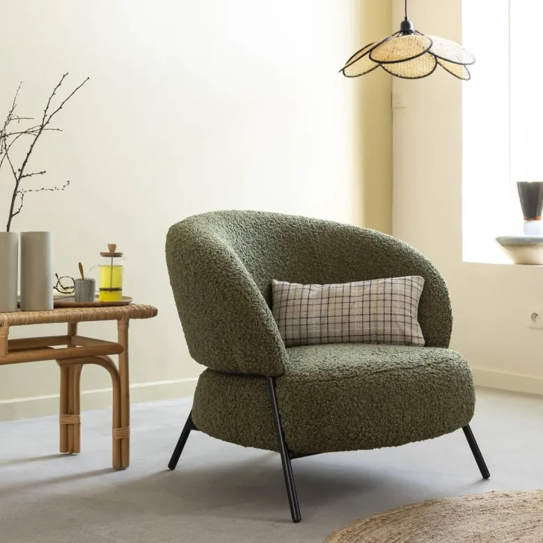 Fauteuil en tissu vert