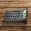 Horloge bureau 3 en 1 - calculatrice - thermomètre réveil
