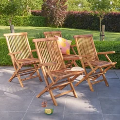 Lot de 4 fauteuils en teck huilé