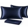 Lot de 2 taies d'oreiller satin effet soie 50x70 cm, bleu nuit