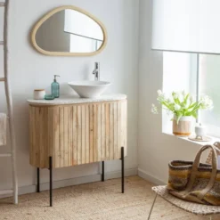 Meuble sous vasque en bois et terrazzo