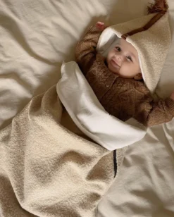Nid d'ange bébé moumoute beige