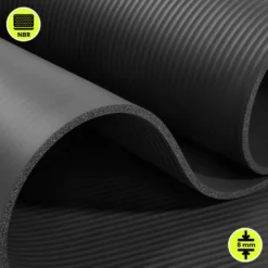 Tapis de yoga et fitness hypermotion nbr 183x61x0,8 cm noir avec sangle