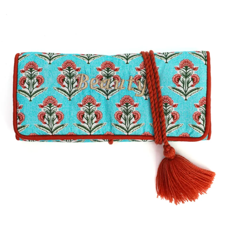 Trousse à bijoux de voyage artisanale roulée et brodée en tissu Bleu
